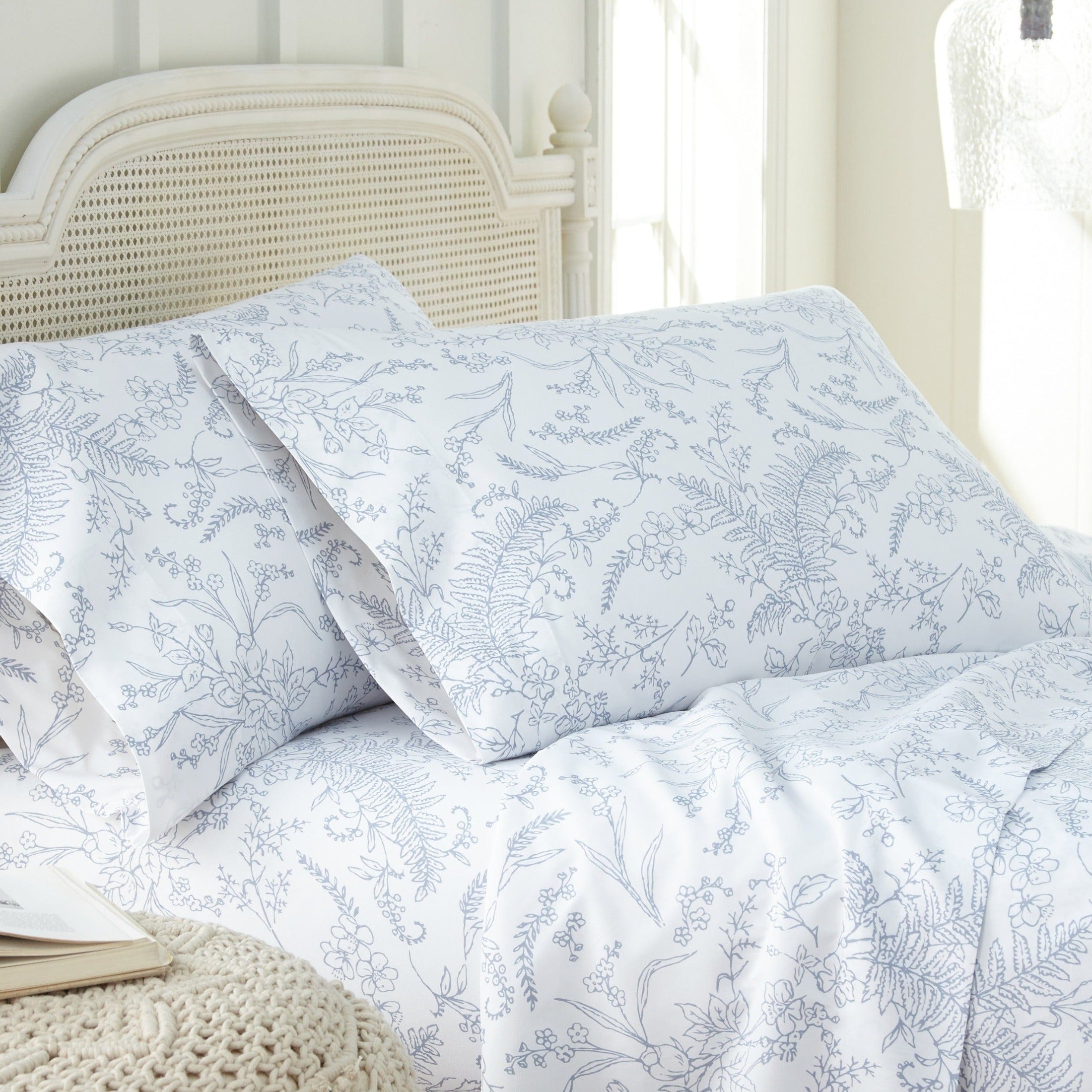 Side View of Winter Brush Pillow Cases in White and Blue Flowers#color_winter-brush-white-with-blue-flowers