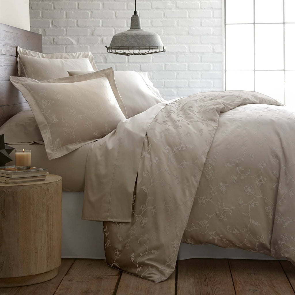 Side View of Sweetbrier Duvet Cover Set in Soft Sand with White Flowers#color_sweetbrier-soft-sand-with-white-flowers