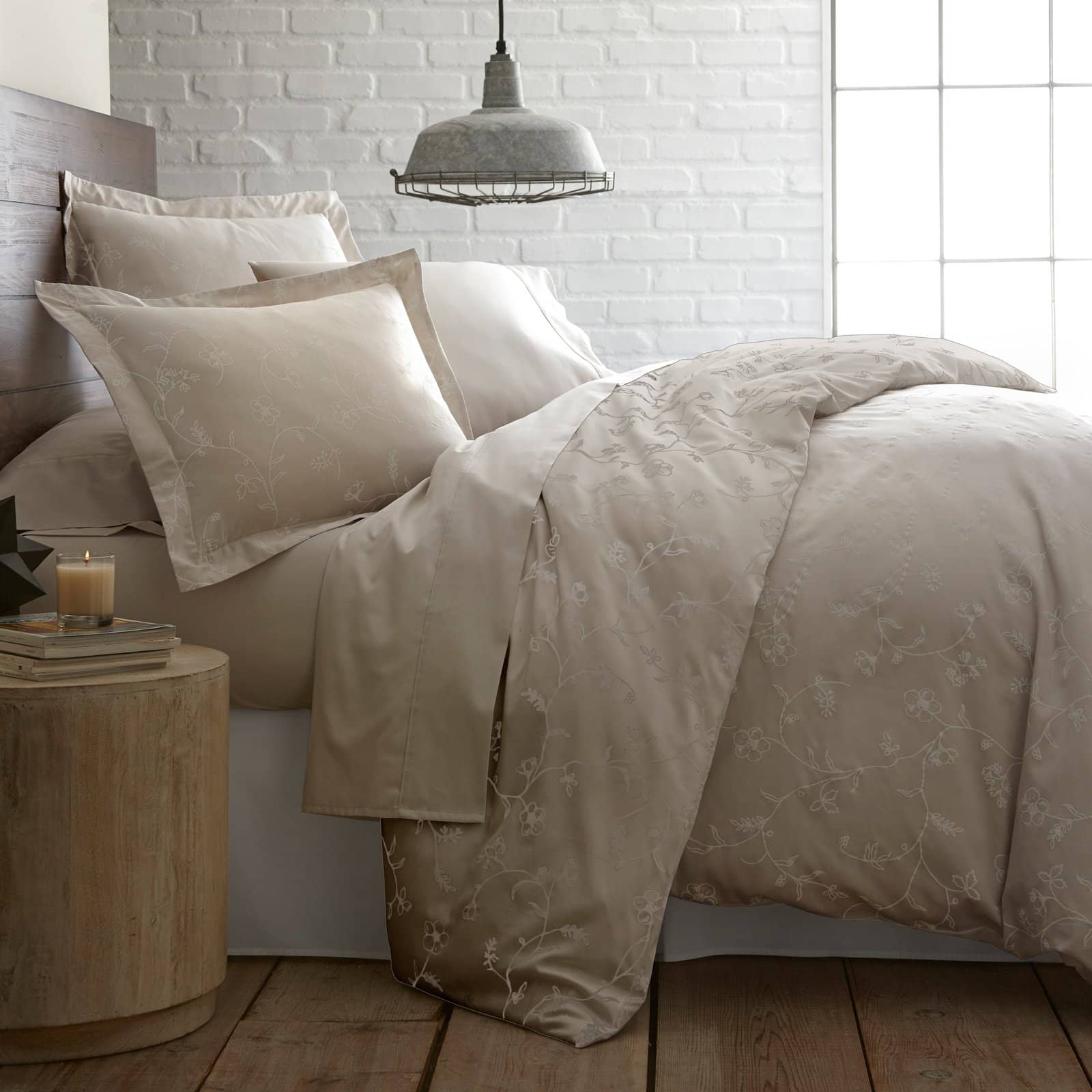 Side View of Sweetbrier Duvet Cover Set in Soft Sand with White Flowers#color_sweetbrier-soft-sand-with-white-flowers