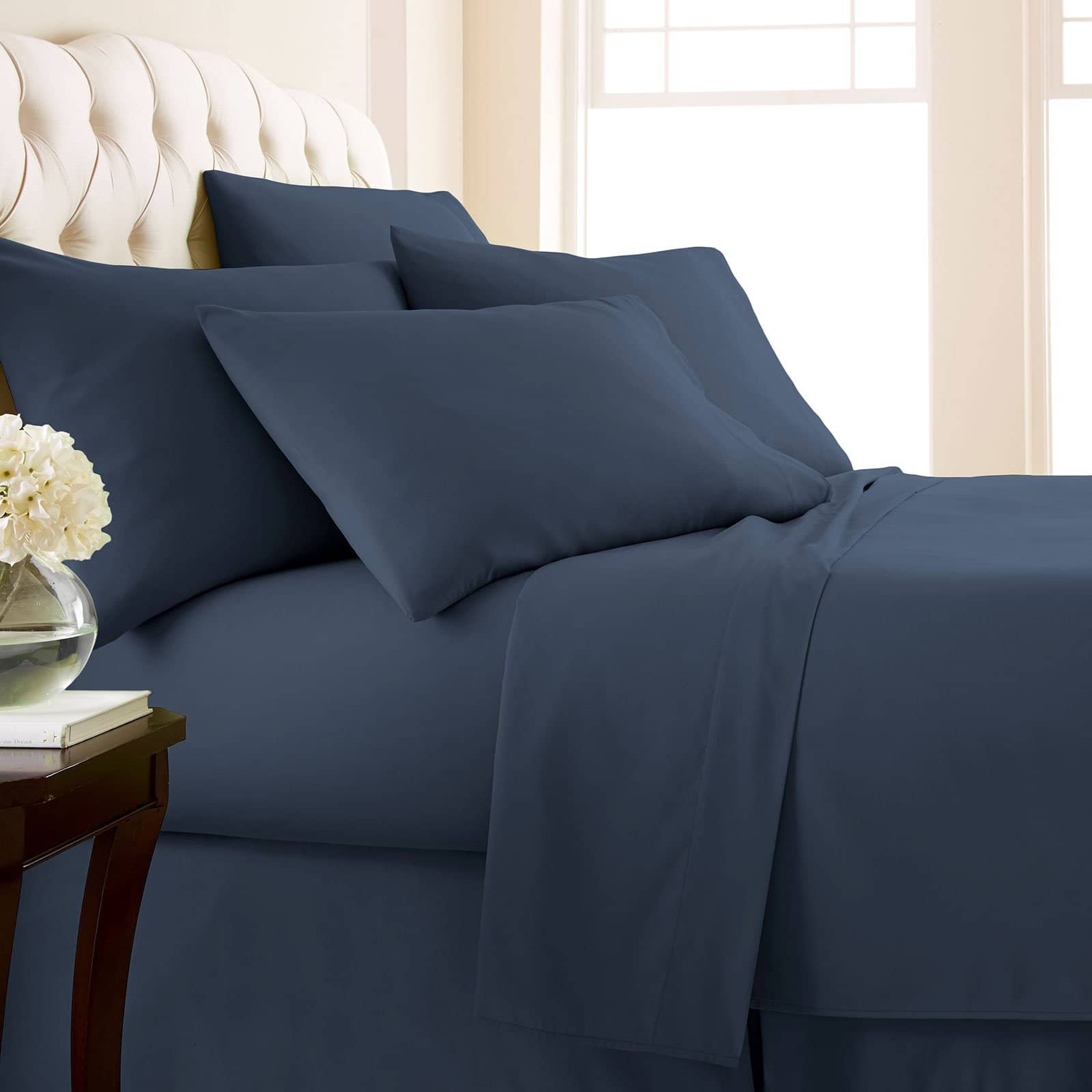 Side View of Vilano Extra Deep Pocket 6-Piece Sheet Set in Dark Blue#color_vilano-dark-blue