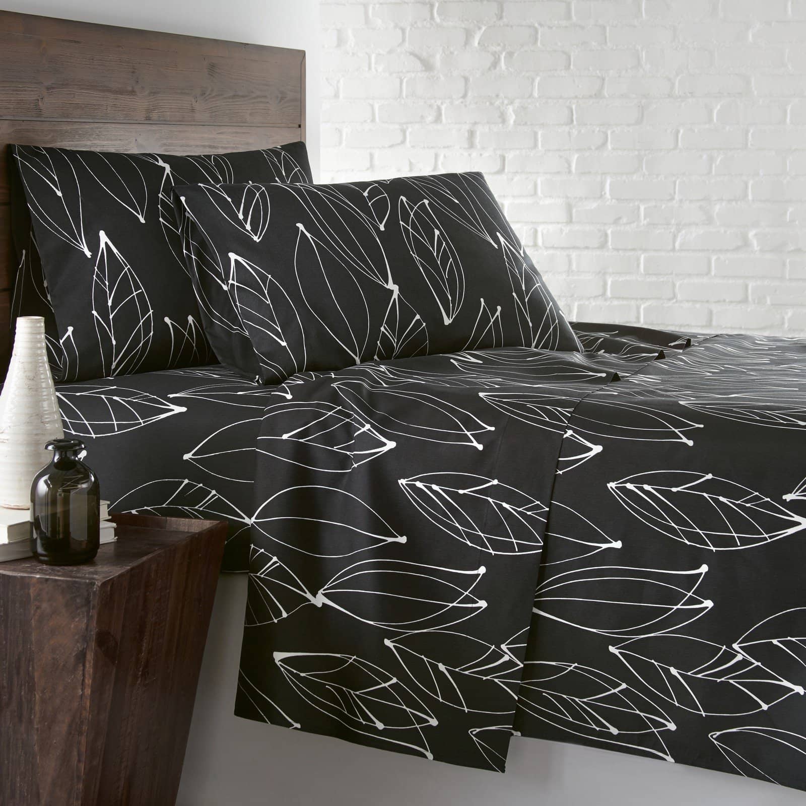 Side View of Modern Foliage Sheet Set in Black#color_modern-foliage-black