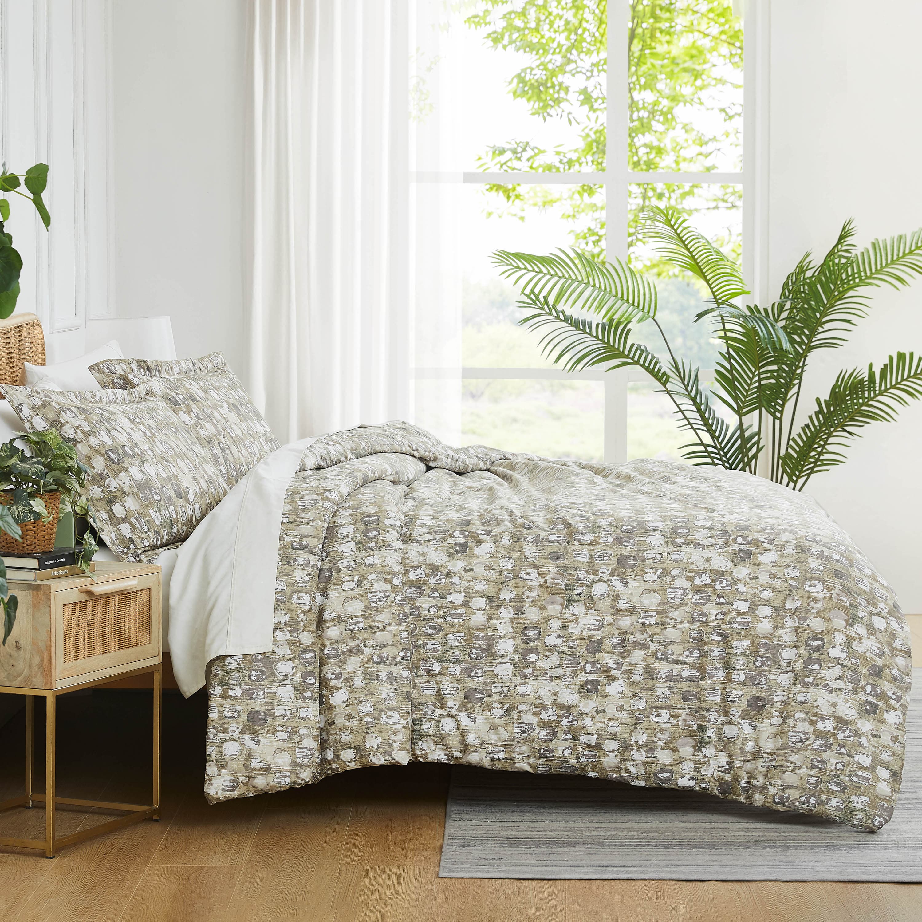 Side View of Rhythm Comforter Set in taupe#color_rhythm-taupe