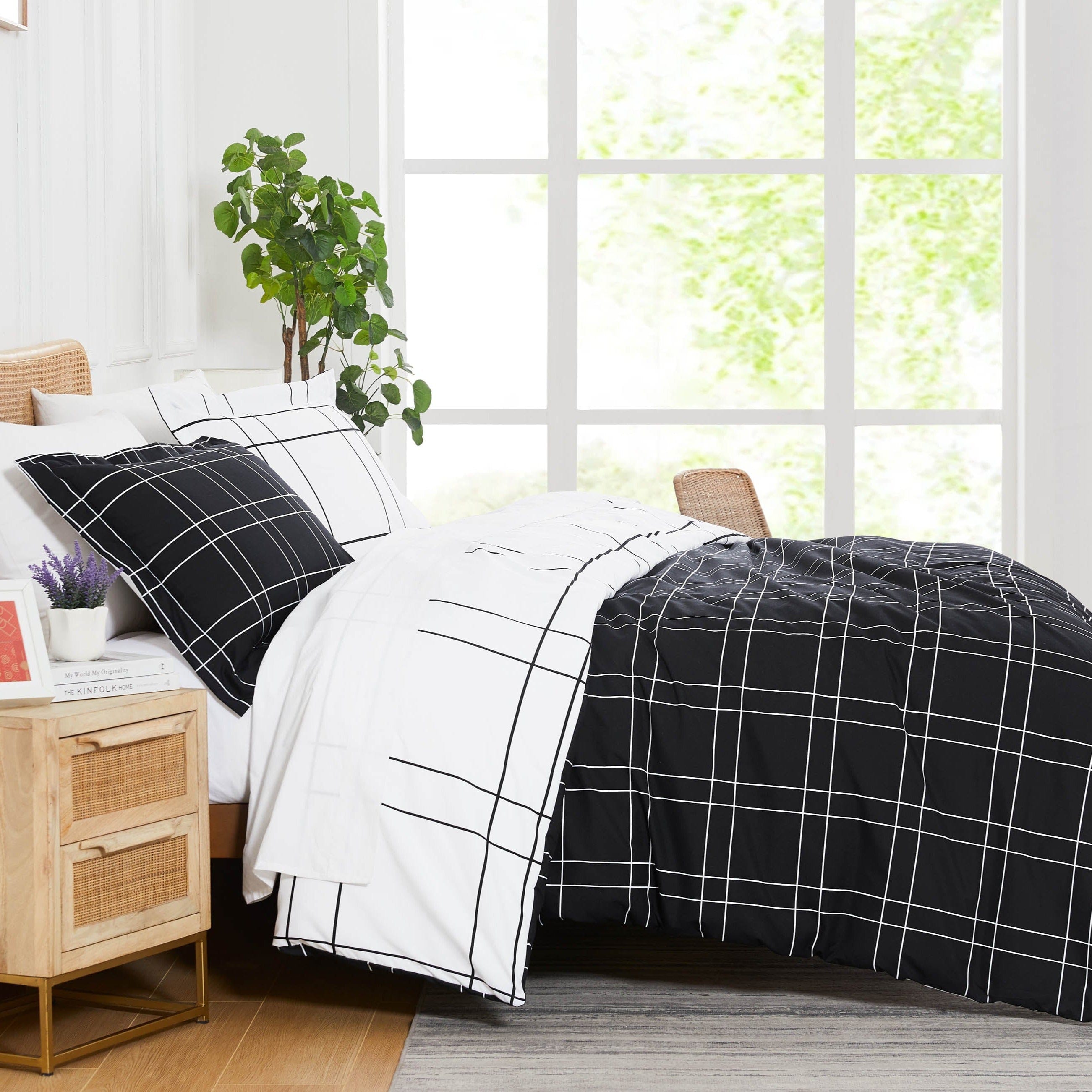 Side View of Urban Grid Reversible Comforter Set #color_urban-grid-black