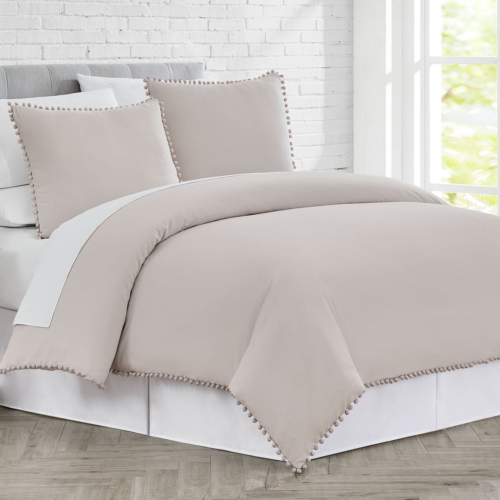 Side View of Pom-Pom Duvet Cover Set in Bone#color_bone