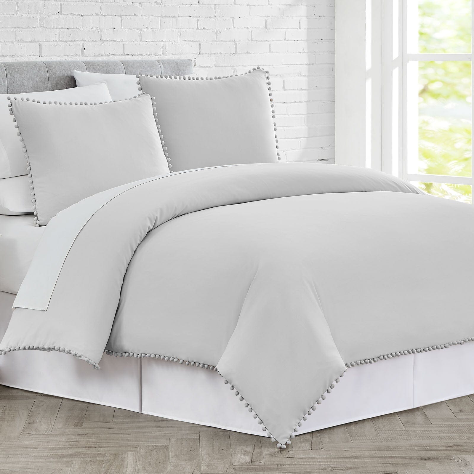 Side View of Pom-Pom Duvet Cover Set in Light Grey#color_light-grey