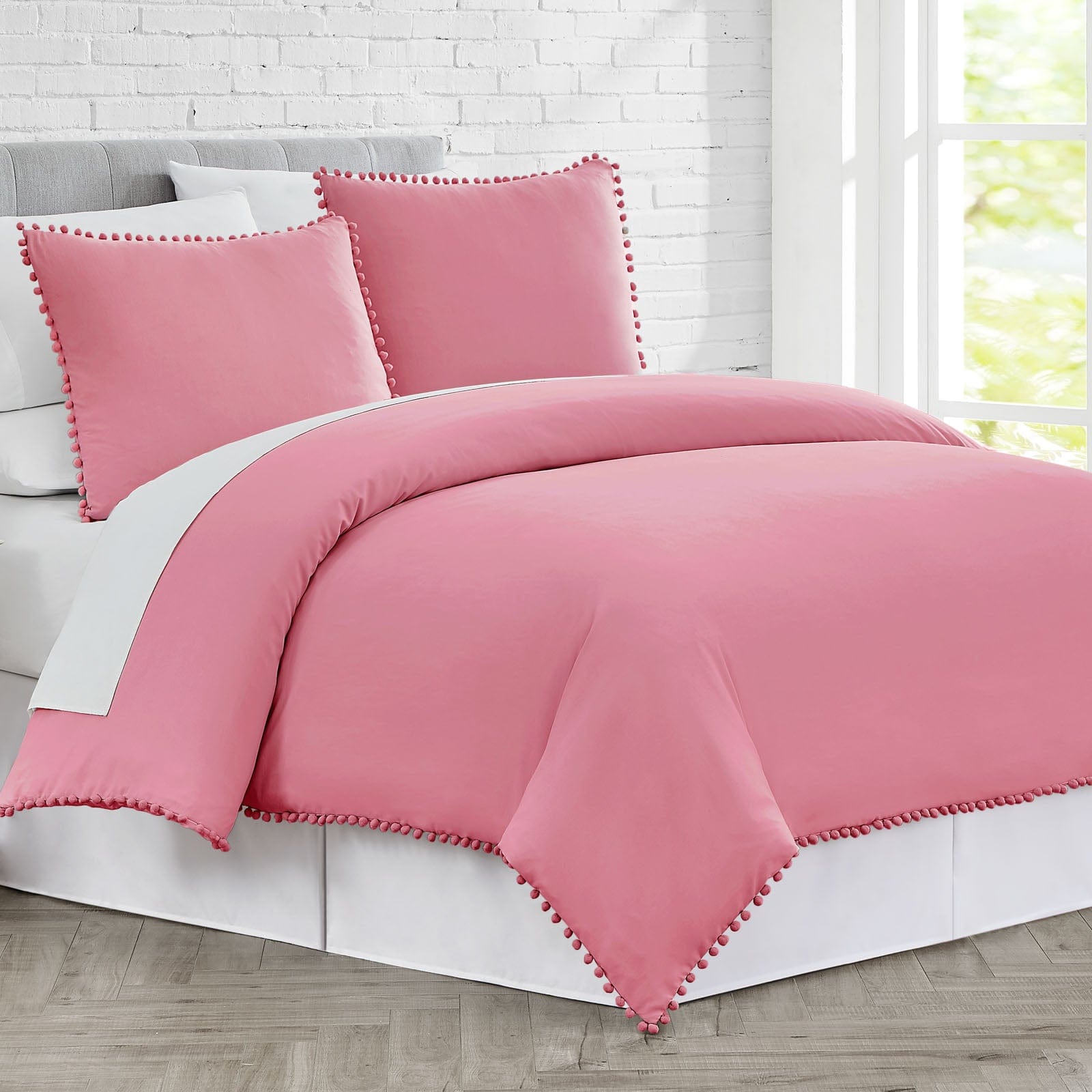 Side View of Pom-Pom Duvet Cover Set in Rose#color_rose