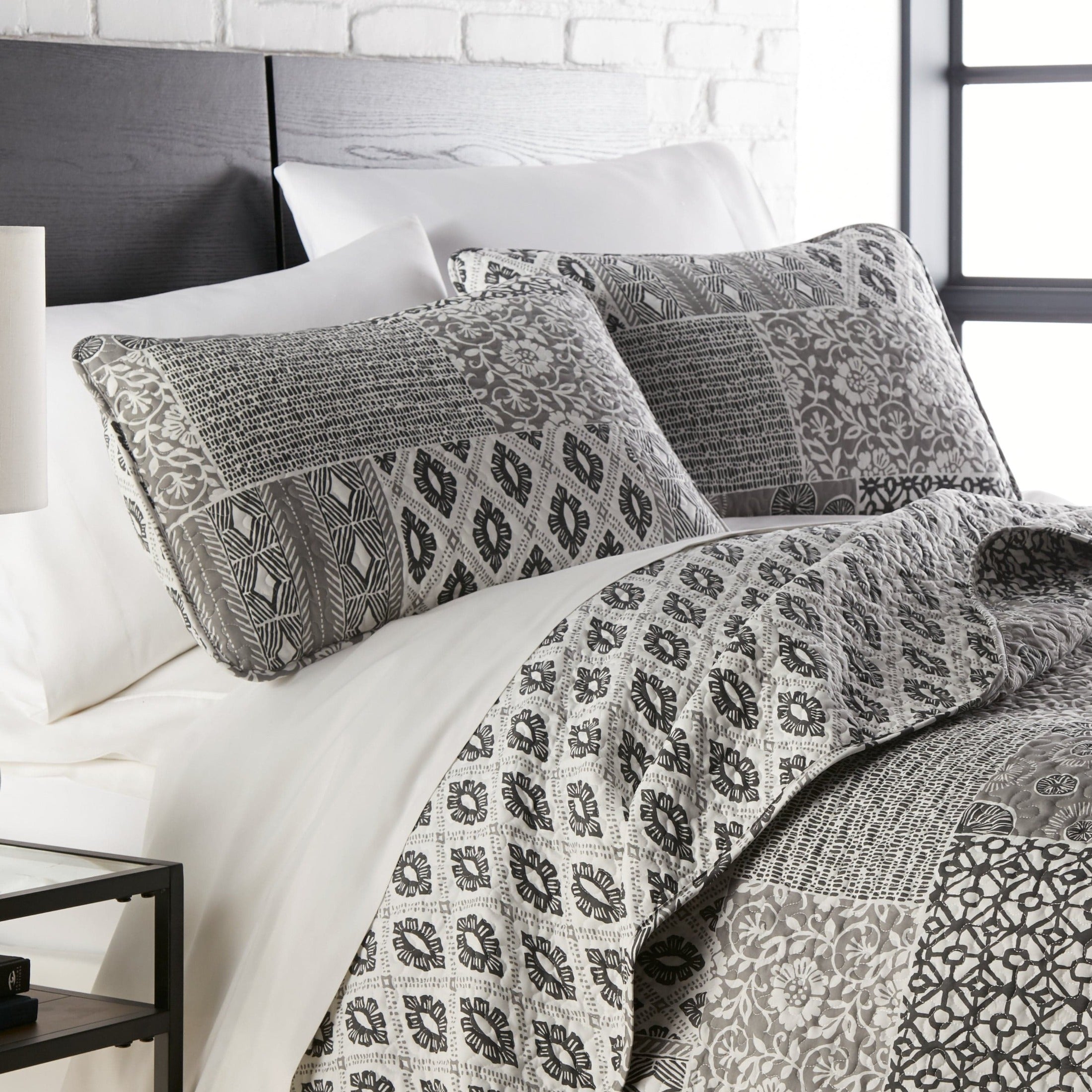 Side View of Global Patch Quilted Sham Covers in Grey#color_global-patch-grey