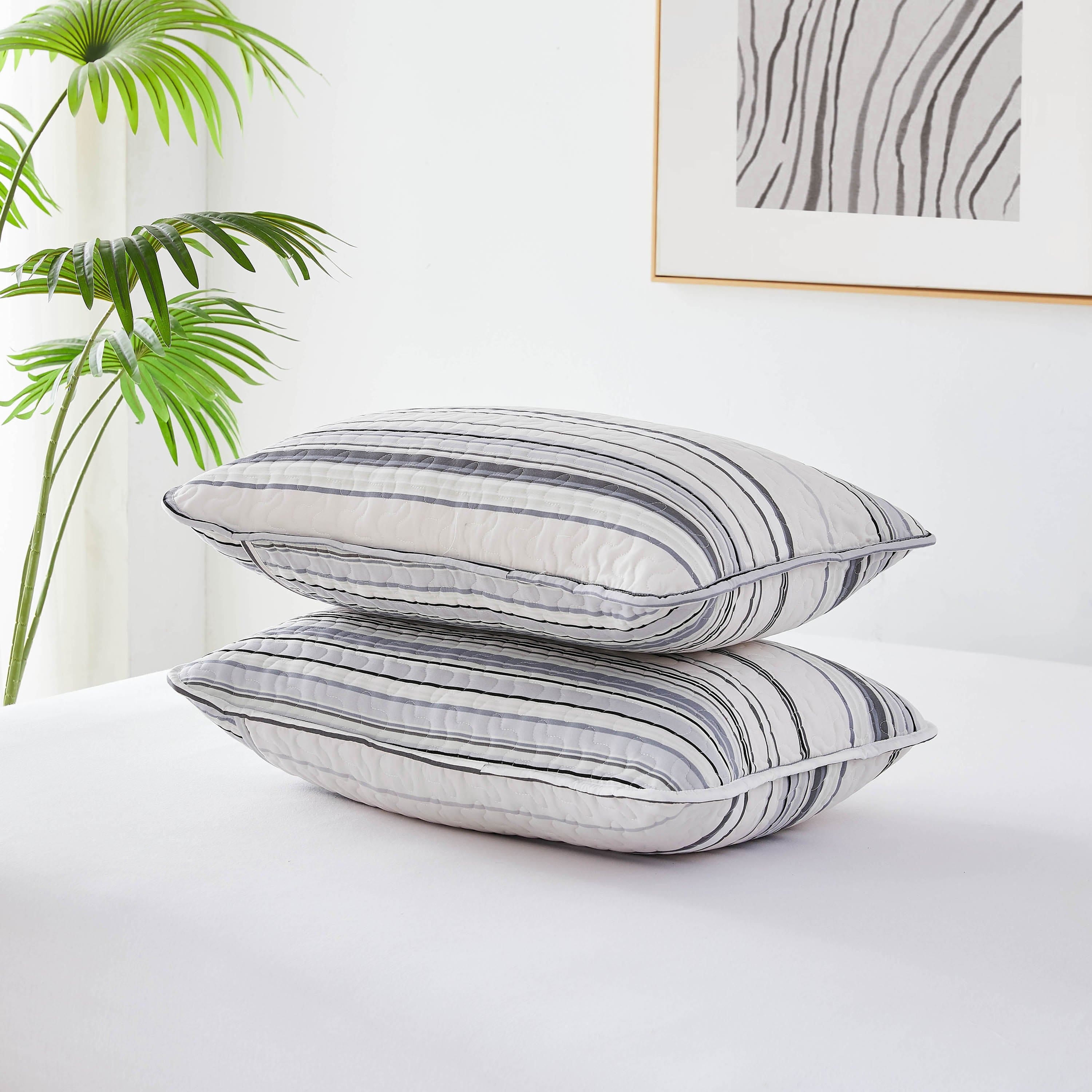 Stack of Coastal Stripes Quilted Sham Covers in Grey#color_coastal-stripe-grey