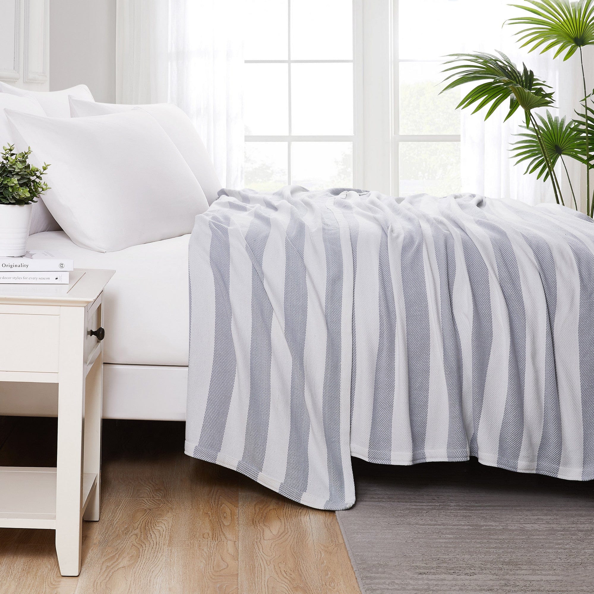 Side View of Striped Cotton Blankets and Throws in Lunar Grey#color_striped-lunar-grey