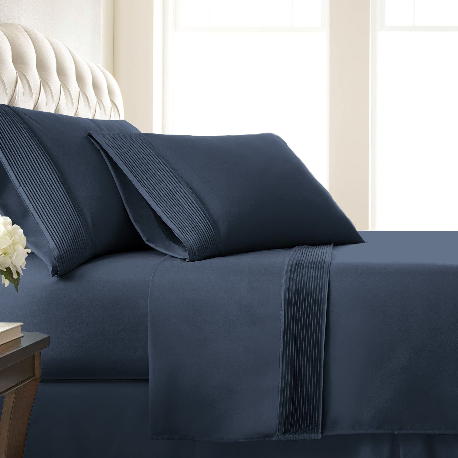 Side View of Vilano Extra Deep Pocket Pleated Sheet Set in Dark Blue#color_vilano-dark-blue