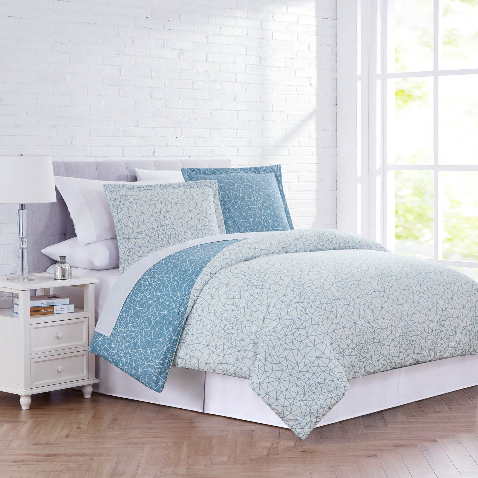 Side View of Geometric Maze Reversible Comforter Set in Blue#color_geometric-maze-blue