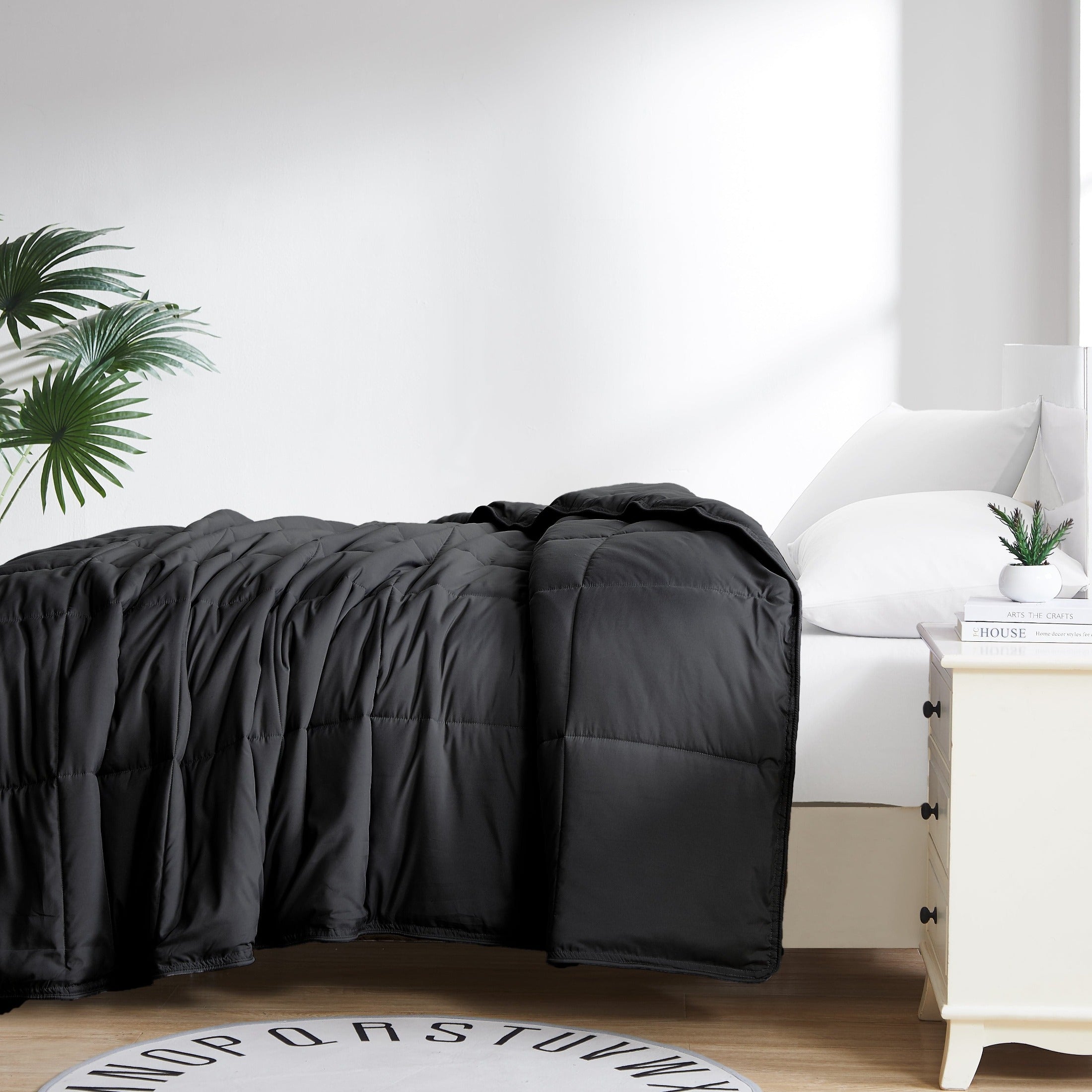 Side View of Vilano Down Alternative Comforter in Black#color_vilano-black