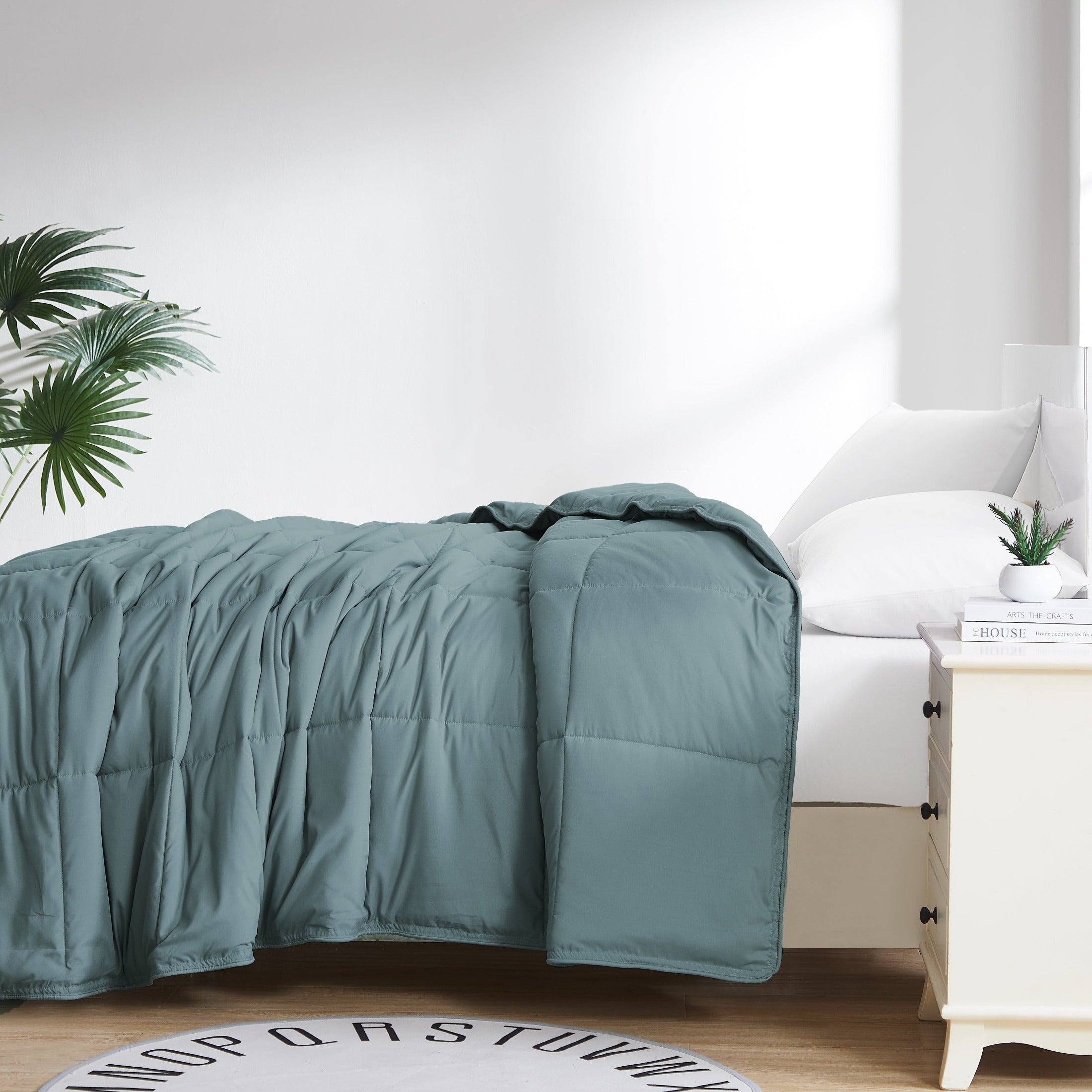 Side View of Vilano Down Alternative Comforter in Steel Blue#color_vilano-steel-blue