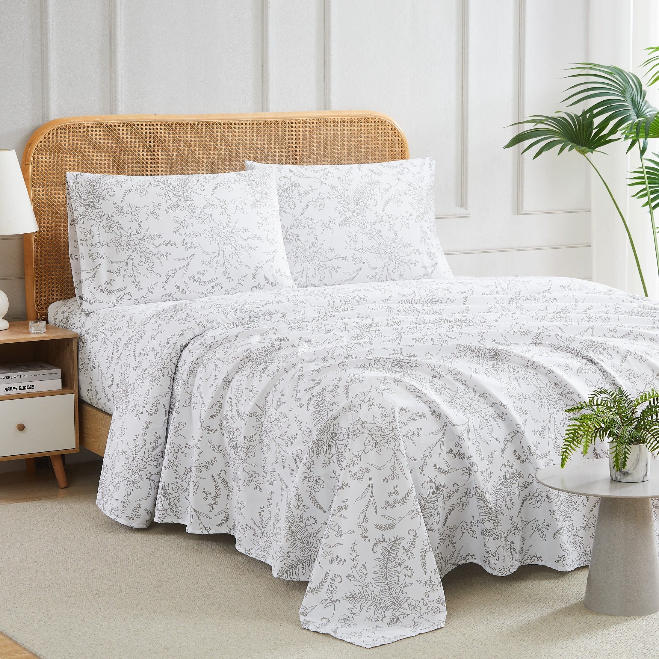 Side View of Winter Brush Sheet Set in White and Steel Grey Flowers#color_winter-brush-white-with-steel-gray-flowers